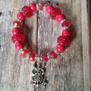 Red bead bracelet with owl charm